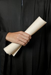 hand holding diploma